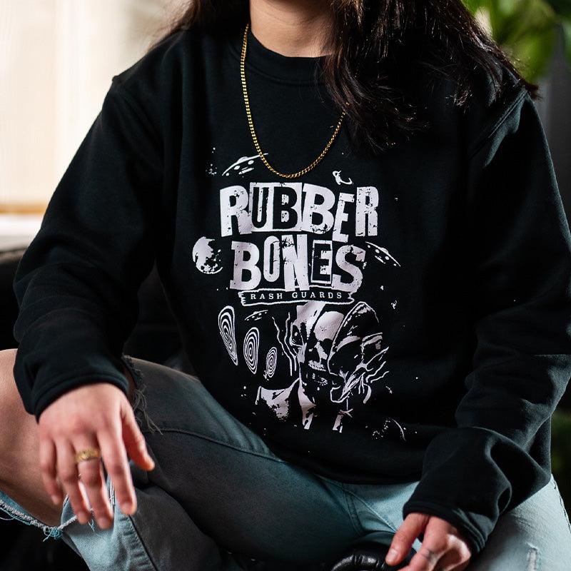 On-body shot of the Cosmic Truth Crew Neck Sweater showcasing bold cosmic-inspired artwork, front view.