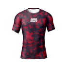 Ember Men’s BJJ Rash Guard – short sleeve red and black rash guard with white Rubber Bones logo on chest, front view on plain background.