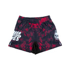 Front view of Rubber Bones Ember BJJ shorts in black and red tie-dye pattern with white skull and logo graphics on each leg.