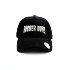 Black corduroy dad hat with embroidered Rubber Bones logo in white – front view