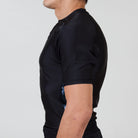 Alternate side profile of the Men’s Ash BJJ Rash Guard showing sleek fit and contrasting marble detail.