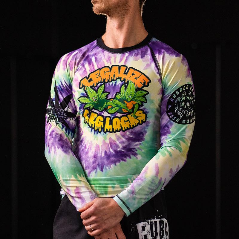 On-body front view of Legalize Leg Locks Long Sleeve Rash Guard with bold tie-dye colors and unique design.