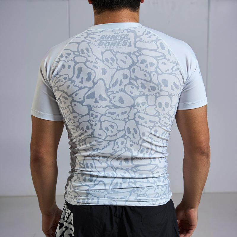 On-body back view of Ranked Rash Guard - White highlighting bold skull web pattern.
