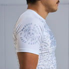 On-body sleeve view of Ranked Rash Guard - White with Rubber Bones logo and skull web pattern.