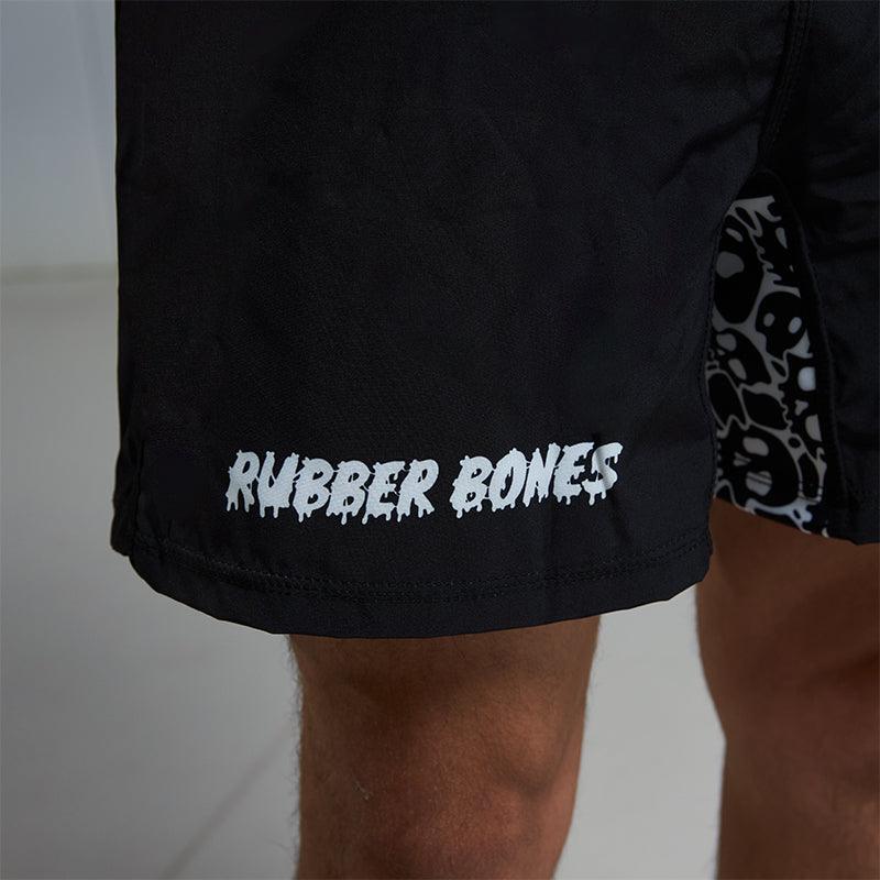 Close-up of the logo design on Competition Grappling Shorts, black and white design