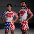 On-body shot of male and female athletes wearing the full Independence set, including grappling shorts and rash guard.