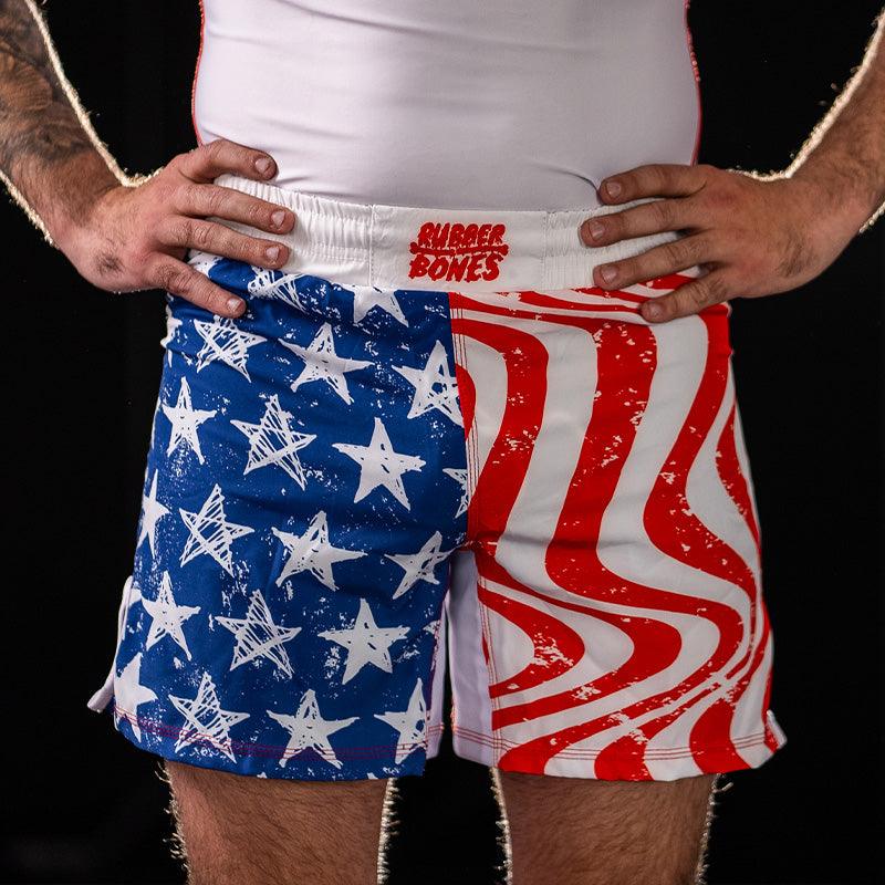 On-body front view of Independence Grappling Shorts featuring American flag-inspired design.