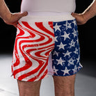 On-body back view of Independence Grappling Shorts showcasing American flag-inspired design.