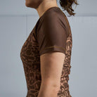 On-body side sleeve view of Women's Brown Ranked Rash Guard with blank sleeve design.