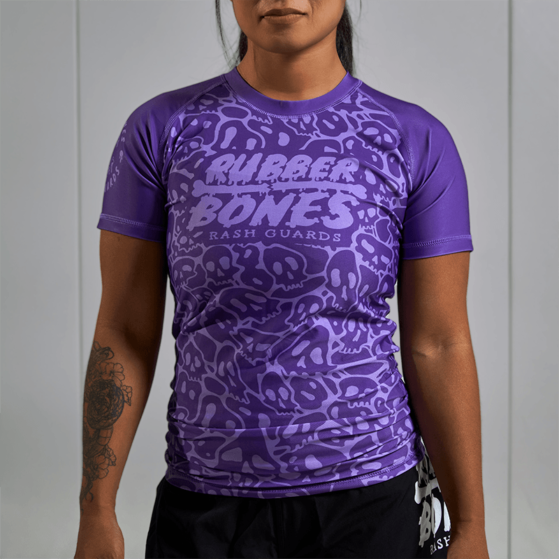 On-body front view of Women's Purple Ranked Rash Guard, highlighting the fit and design.