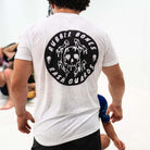 On-body back view of White Skull Back T-Shirt featuring striking skull design