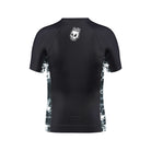 Back view of the Kids Ash BJJ Rash Guard showing black design with white skull Rubber Bones logo near neckline and white marble-style side panels.