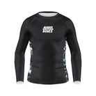 Kids Long Sleeve Ash BJJ Rash Guard – black rash guard with white Rubber Bones logo on chest and gray marble side panels, front view on plain background.