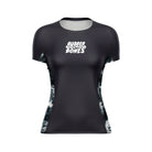 Women’s Ash BJJ Rash Guard – black short sleeve rash guard with white Rubber Bones logo on chest and marble-style side panels, front view on plain background.