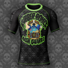 Bad Bone Rash Guard with bold full-color illustration of a dog and skull pattern in black, grey, and green.