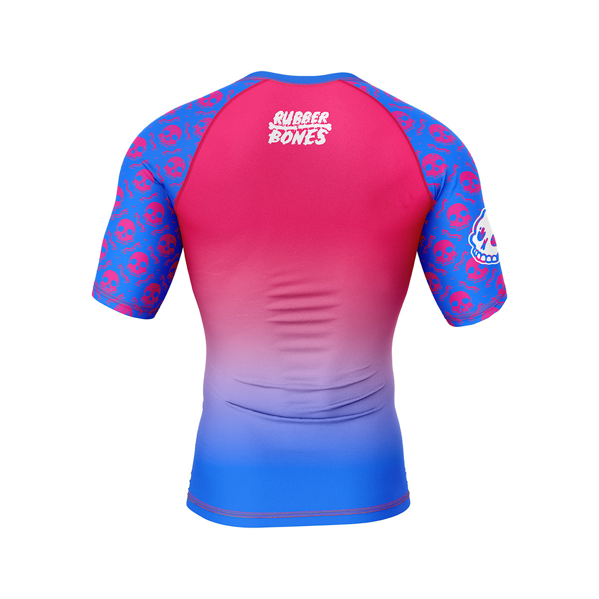 Back flat lay of the Toxic Berry men’s no gi grappling rash guard from the Deadly Harvest Collection with blue skull pattern sleeves and pink fade body.
