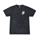 Front view of the Rubber Bones Guillotine T-Shirt in mineral black with a small white melting skull logo printed on the left chest. Each shirt has a unique mineral wash texture.