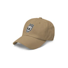 Khaki Dad Hat - Angled View: A side-angled view of the khaki dad hat, featuring the Rubber Bones icon embroidered in white and black.