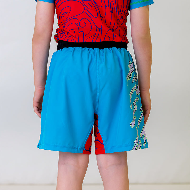 Light blue Hannya Youth Shorts, back view, showcasing design elements from the Hannya-inspired collection.