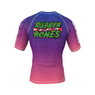 Back view of the Krampus BJJ rash guard featuring a deep purple-to-red gradient with a festive yet eerie design. The Rubber Bones logo is styled with Christmas tree textures and glowing ornaments.