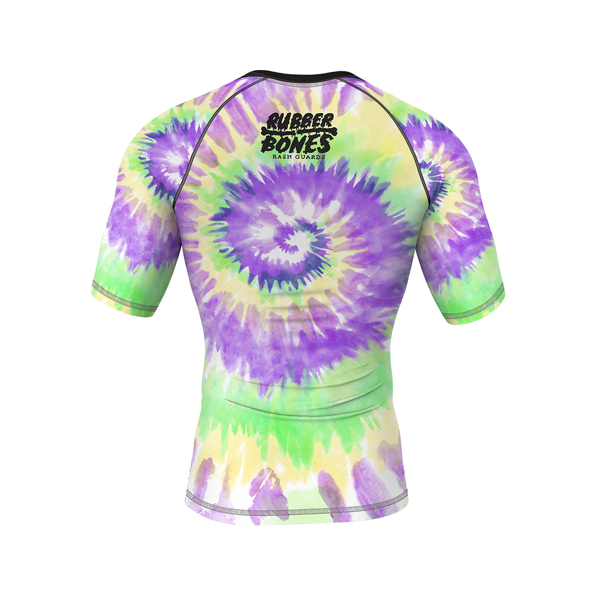 Tie-dye short-sleeve BJJ rash guard in purple, green, and yellow with a spiral pattern. Features the 'Rubber Bones Rash Guards' logo in black on the upper back.