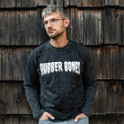 Black Long Sleeve Acid Wash T-Shirt worn on body, white Rubber Bones logo on the front.