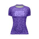 Mock-up of Women's Purple Ranked Rash Guard featuring sleek purple design with skull web pattern and IBJJF-approved style.