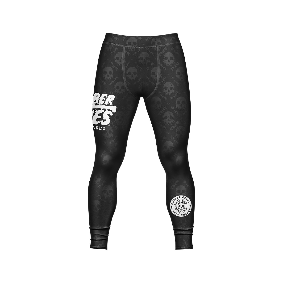 Front view of the Rubber Bones Skulls men's BJJ spats – Black compression leggings with an all-over skull pattern, Rubber Bones logo, and a circular emblem near the ankle.