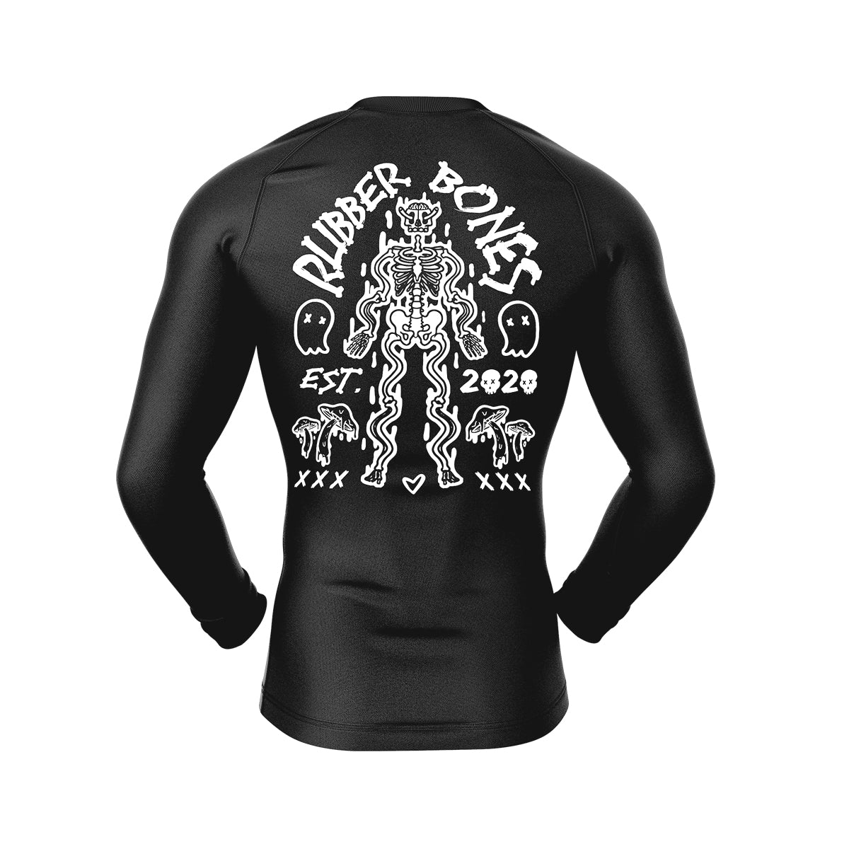 Back view of a black long-sleeve BJJ rash guard with a bold white graphic of a skeleton surrounded by ghosts, mushrooms, and text reading "Rubber Bones" and "Est. 2020.