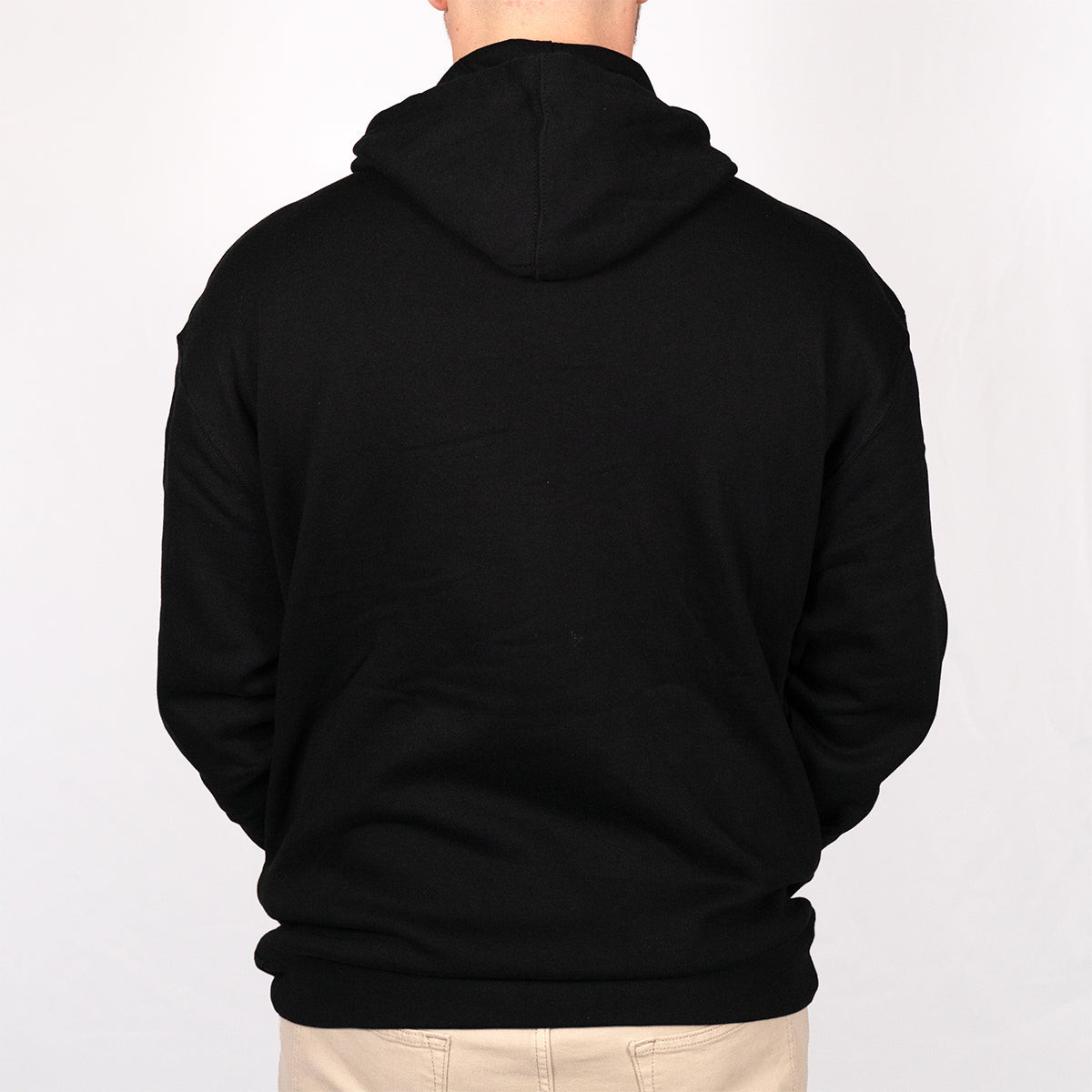 Back view of black Rubber Bones logo hoodie showing plain black back panel, double-drawstring hood, and heavyweight Independent Trading Co fleece.